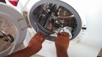 Sửa máy giặt bị rò nước chảy nước ra ngoài